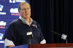 Bill Belichick shares a joke with the media